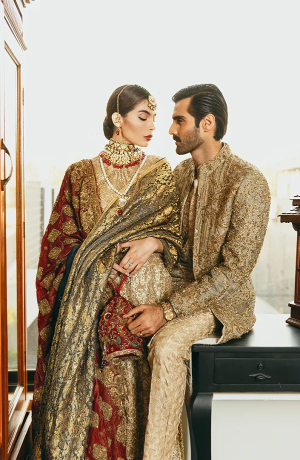 Embroidered Beige Kurta Paired with a fully embellished Gold Sherwani By HSY